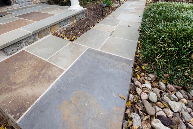 Varied colored walkways provide harmony and are an elegant welcome